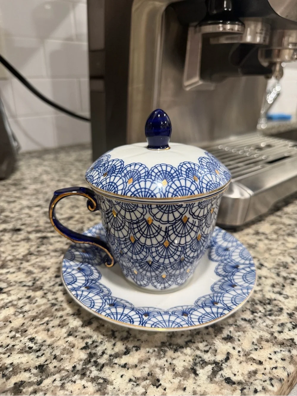 Vintage Blue and Gold Porcelain Lidded Teacup with Saucer